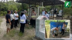 Petugas kepolisian bersama warga mengecek area pemakaman di Desa Lebo, Kecamatan Pematang Karau, Kabupaten Barito Timur, setelah 14 makam dilaporkan dibongkar orang tak dikenal